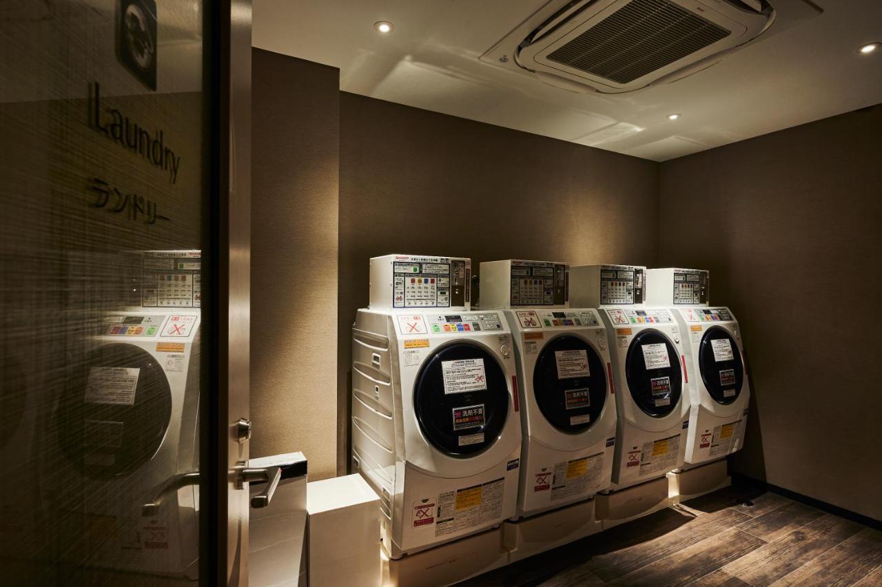 The Royal Park Hotel Iconic Osaka Midosuji Exterior photo Laundry room
