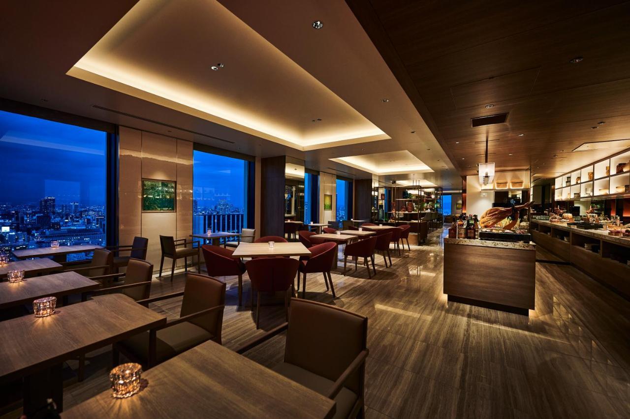 The Royal Park Hotel Iconic Osaka Midosuji Exterior photo The lounge at the Tokyo International Airport